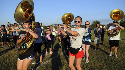 Junior Nora Kupiec, 16, plays the flute Aug. 28 as she practices with the Moon Area High School band at McCormick Elementary School.