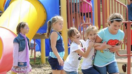 Third-graders play during recess Aug. 29 at Burkett Elementary School in Robinson. Montour School District has closed Ingram Elementary School and placed all third- and fourth-graders at Burkett. Students in K-2 attend Forest Grove Elementary School, also in Robinson.