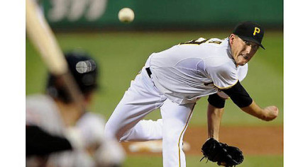Pirates starter Kevin Correia delivers against the Astros.