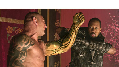 Dave Bautista, left, and RZA star in "The Man With the Iron Fists," an action-adventure inspired by kung-fu classics. Russell Crowe and Lucy Liu are also in the movie, which opens Nov. 2.
