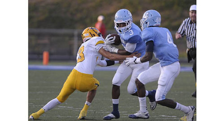 Central Valley's Jordan Whitehead is tackled by Montour's Devin Wilson Thursday at Central Valley.