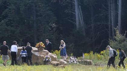 In this photo from September 2011, those who lost family members on United Flight 93 visit the tree line where the plane crashed 10 years earlier.