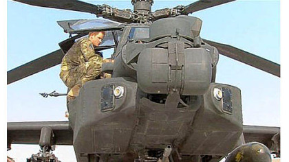 Prince Harry is shown in an Apache helicopter Friday in an image taken from video by a member of his squadron at Camp Bastion in Afghanistan.