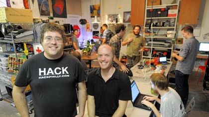 Chris Thompson, left, and Jordan Miller, board members of Hive76, a "hacker's space" in the Spring Garden neighborhood of Philadelphia, pose for a portrait.