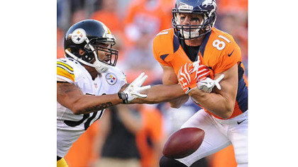 The Steelers' Larry Foote breaks up pass intended for the Broncos' Joel Dreessen.