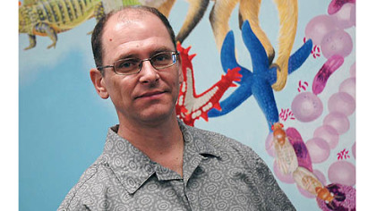 Duquesne biologist David Lampe, who holds a doctoral degree in entomology, is developing a "substantially improved strategy" to defend against malaria that neither opts to kill the insect nor uses drugs against the malarial parasite.