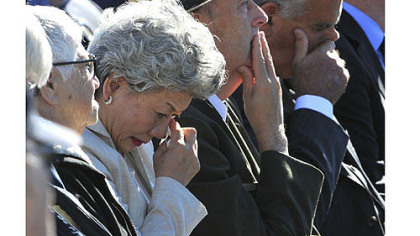 People in the family area of the audience at the Flight 93 National Memorial react during the speech by Vice President Joe Biden during the 11th commemoration of the crash of Flight 93.