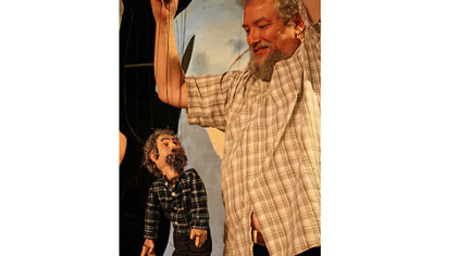 John Gresh plays the lead role in Caravan Theatre's "800 Words: The Transmigration of Philip K. Dick," a production that incorporates the writer's visions and hallucinations.