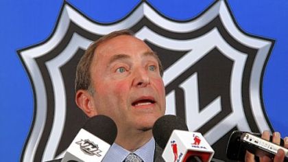 NHL commissioner Gary Bettman speaks to reporters after meeting with the NHL Players' Association representatives during a news conference at NHL headquarters in New York.