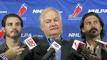 NHL Players' Association executive director Don Fehr, center, said negotiations are possible before the CBA expires Saturday.