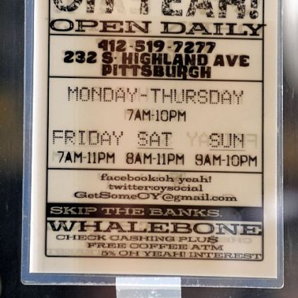A sign on the door advertises check cashing at the store.