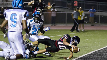 Gail Witenske shared this photo of Upper St. Clair senior quarterback Pete Coughlin diving into the end zone for a fourth-quarter touchdown against Woodland Hills on Aug. 31. Upper St. Clair won the game, 31-12.