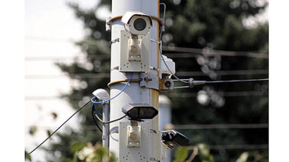 This pole at South Braddock Avenue and Hutchinson Street holds an array of high definition and automatic license plate recognition cameras, which snap photos of the license plates of all passing motorists, reads them and enters them into a database so police can search to see if a suspect vehicle has passed.