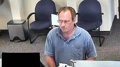 A photo captured from video Sept. 10 in an Erie bank of the robbery suspect known as the "Bucket List Bandit," identified by the FBI as Michael Eugene Brewster.