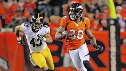 Broncos receiver Demaryius Thomas carries the ball ahead of Troy Polamalu for a 71-yard touchdown in the third quarter Sunday in Denver.