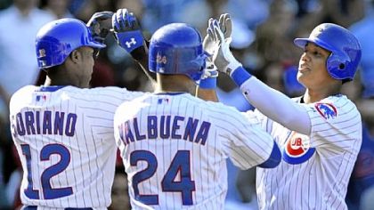 The Cubs' Starlin Castro celebrates with teammates Alfonso Soriano and Luis Valbuena Friday after hitting a three-run home run in the sixth inning against the Pirates in Chicago.