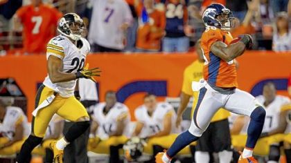 Broncos receiver Demaryius Thomas runs for a 71-yard touchdown against Steelers safety Ryan Mundy Sunday in Denver.