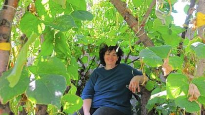 Artist Rose Clancy at her  garden/art installation called GardenLab@510 in the North Side.