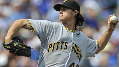 Pirates starter Jeff Locke delivers in the first inning against the Cubs in Chicago.