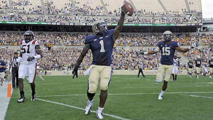 Pitt's Ray Graham scores a touchdown against Virginia Tech in the third quarter of today's game at Heinz Field.