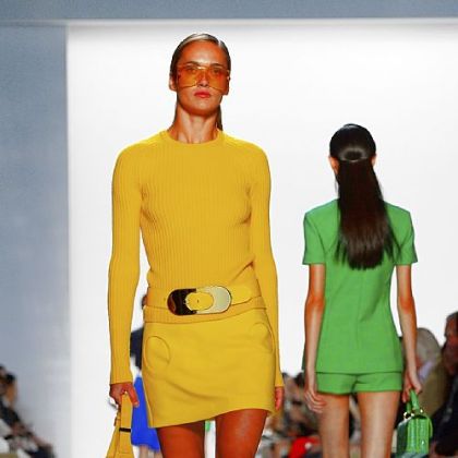 Models display creations for Michael Kors.