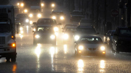 Cars are surrounded by a rainy mist early Tuesday morning inbound along Fifth Avenue approaching Downtown Pittsburgh.