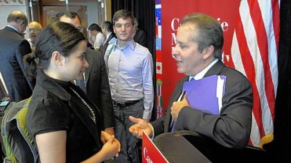 Gene D. Sperling, one of President Barack Obama's top advisers and director of the National Economic Council, answers student Ketaki Desai's question following a talk at Carnegie Mellon University.