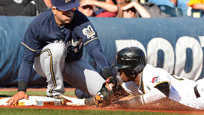 Brewers third baseman Aramis Ramirez tags out Pirates' Starling Matre.