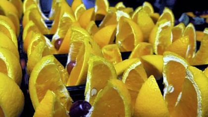 Slices of oranges are arranged at lunchtime at Anthony Wayne Middle School.