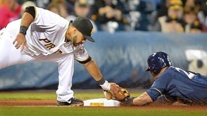 Andrew McCutchen can't track down a ball hit by Milwaukee's Jean Segura in the seventh inning Wednesday at PNC Park. The hit went for a triple. He then scored on an error to put the Brewers ahead, 3-0.
Peter Diana/Post-Gazette