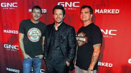 Mark Wahlberg flanked by Brad Arnold, left, and Chris Henderson of 3 Doors Down at Stage AE on the North Side.