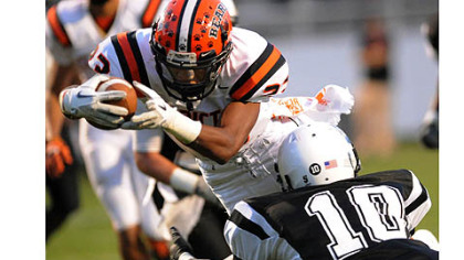 Tyler Boyd dives into the end zone after scrambling, giving Clairton the first touchdown of the game Thursday against Monessen.