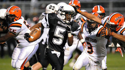 Monessen's Javon Brown looks to turn the corner and pick up yardage Thursday against Clairton.