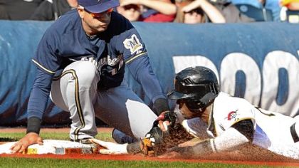 Brewers third baseman Aramis Ramirez tags out Pirates left fielder Starling Marte Thursday at PNC Park.