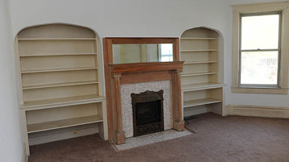 Original details include 4 fireplaces and pocket doors.