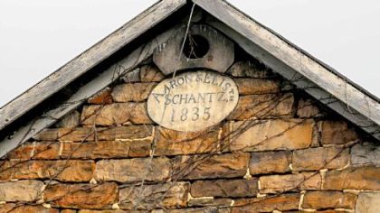 Stones surround the date on the barn near the Wise home.