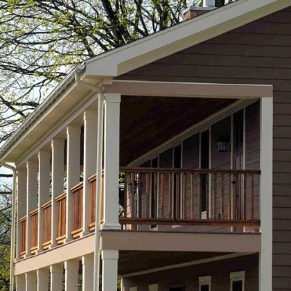 The second-floor porch and front entrance to the Wise home.
