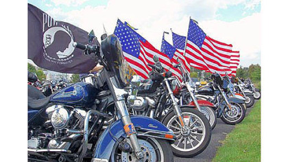 Motorcycles line the parking lot of Battlefield Harley-Davidson in Gettysburg at the conclusion Saturday of the annual Ride to Gettysburg to benefit the Pennsylvania Monuments Endowment Fund, which state Rep. Harry Readshaw, D-Carrick, established in 1997. The riders who join Mr. Readshaw on his annual ride have become known as "Readshaw's Raiders." The ride began in 2001.