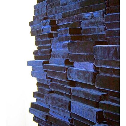 Rachel Lichtenstein's sculpture of books and velvet is part of the installation "Sight Unseen."