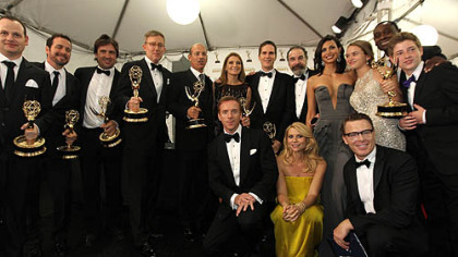 The cast of "Homeland" pose backstage at the 64th Primetime Emmy Awards at the Nokia Theatre on Sunday.