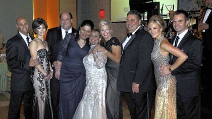 From left, Tino Rionda, Candace Sarris, Steve Heon, Sofia Sarris Heon, Athena Sarris, Jamie Sarris, Bill Sarris, Athena Sarris Simms and Ian Simms.