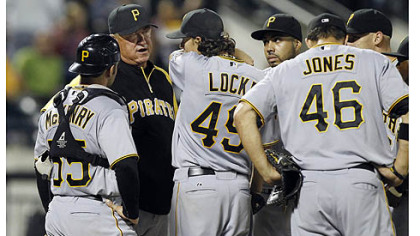 Pirates manager Clint Hurdle talks to starting pitcher Jeff Locke before removing him from the game in the fourth inning. Locke allowed five runs on nine hits in three and two-thirds innings.