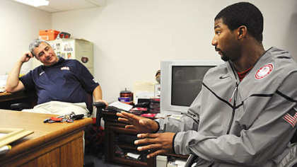 Edinboro coach Jim Glatch, left, and Trevon Jenifer talk shop Friday. Mr. Glatch coached the U.S. wheelchair basketball team to its first medal in 12 years at the Paralympic Games this month.