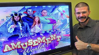Matt Rodgers, founder of South Side-based HeadRight Games and creator of "Amusement World," shows a television screen displaying the game.