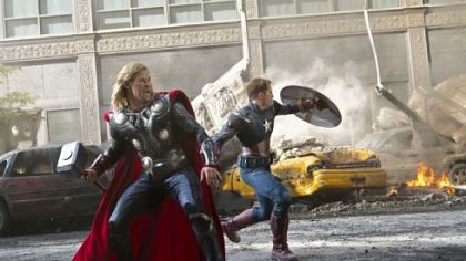 Chris Hemsworth as Thor, left, and Chris Evans as Captain America join other superheroes to save the Earth in "Marvel's The Avengers"