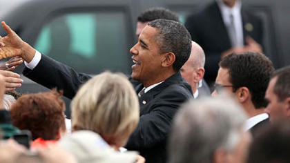 President Barack Obama greets supporters at Toledo Express Airport in Swanton, Ohio on Wednesday.
