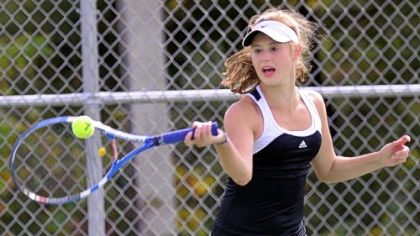 Upper St. Clair's Megan Adamo returns a shot against Mt. Lebanon's Callie Frey in the WPIAL Class AAA singles championship match.