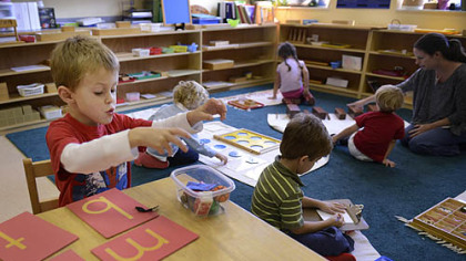 Liam Miller, 4, matches objects with the letter they start with on Thursday at the Glen Montessori School in Ross.