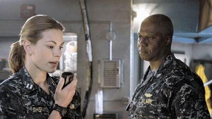 Andre Braugher, right, portrays a rogue captain of a submarine whose crew includes Daisy Betts in ABC's "Last Resort."