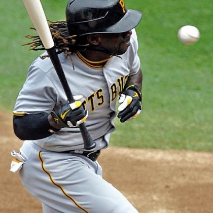 Pirates center fielder Andrew McCutchen ducks a high pitch from Mets starting pitcher R.A. Dickey in the second inning Thursday at Citi Field in New York.